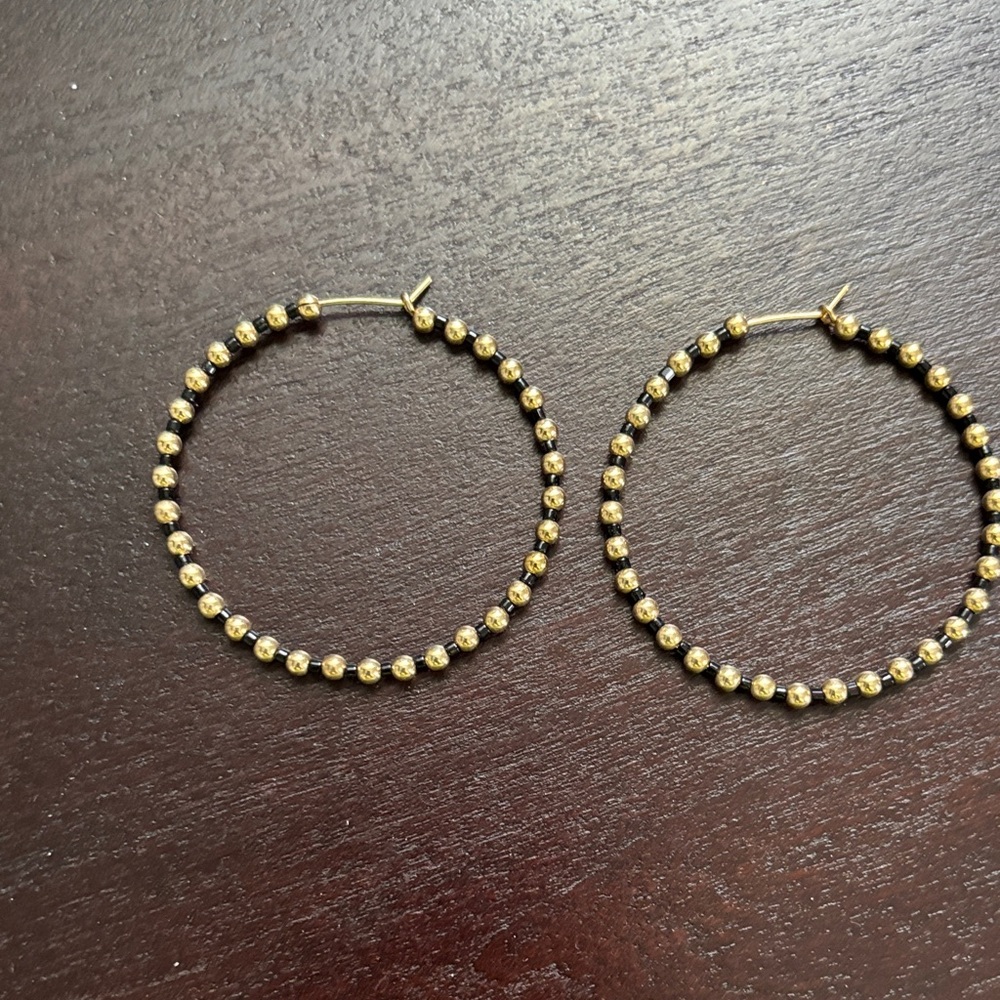 E Newton gold and black beaded earrings